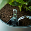 self-watering-insert-17cm-closeup – Detail van geïntegreerd waterreservoir in kunststof insert